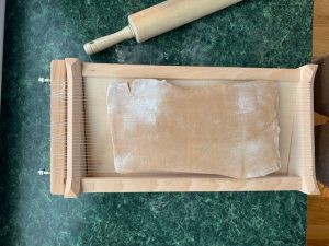 making pasta with chitarra