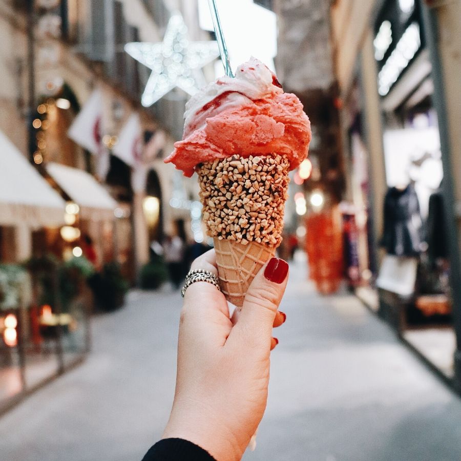 Photo of a woman holding a gelato cone with Casa Mia Tours