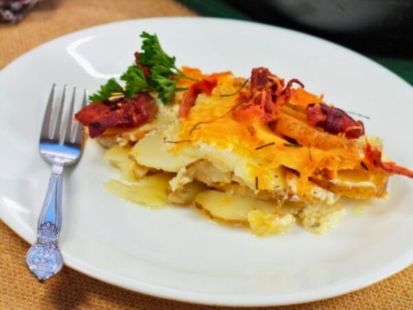 Patate in Tecia serving on white plate