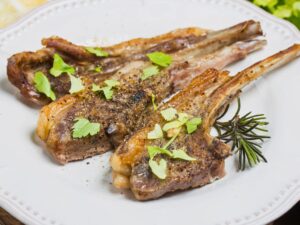 abbacchio a scottaditto lamb cutlets on plate