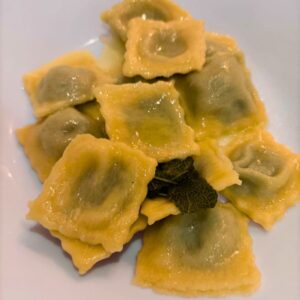 dish of cooked pasta parcels