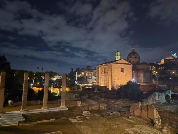 view of the ancient roman forum at night