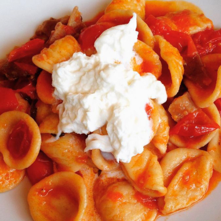 Pasta in a tomato sauce with soft cheese