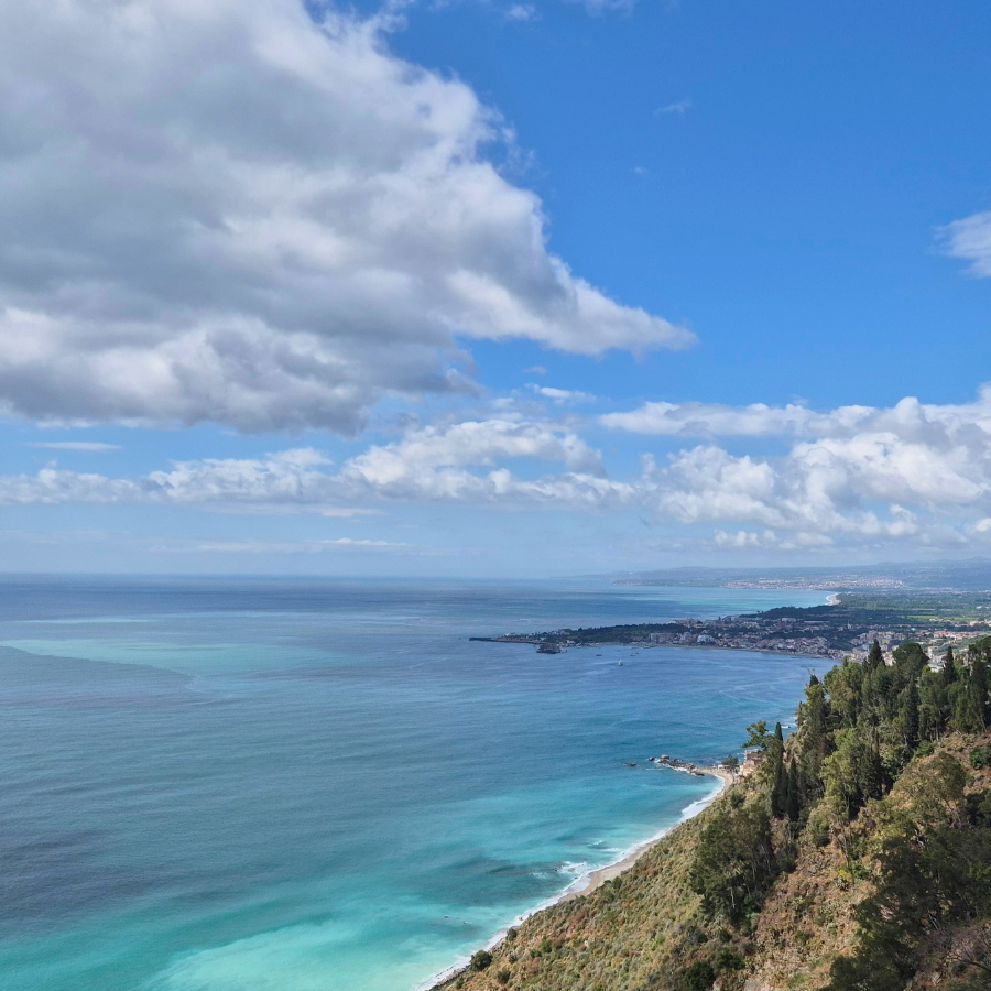 View of coastline and blue skies