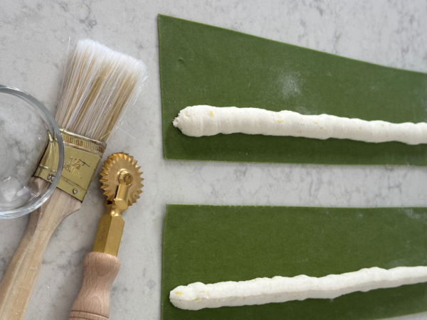 pasta dough and filling laid out 