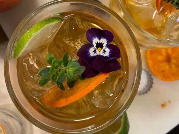 top down view of violet spritz in a glass