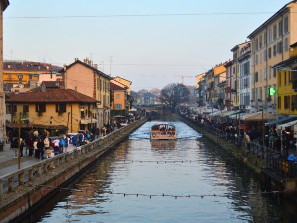view of boat on milan canals at dusk