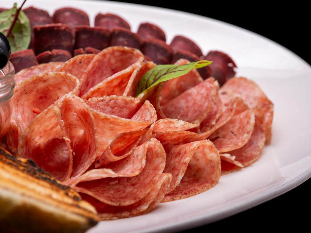 crespone on a plate of mixed salumi